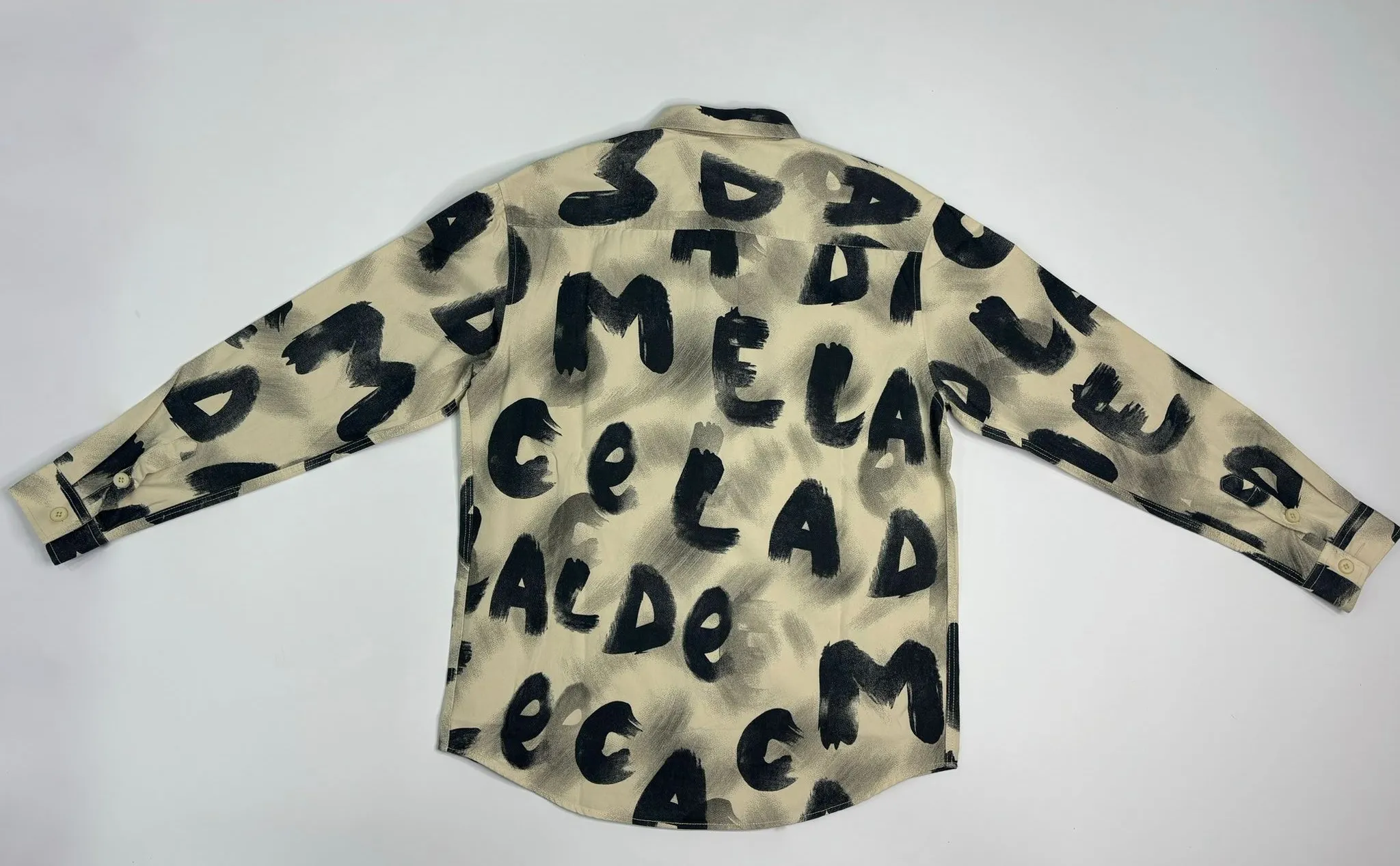 מכופתרת אותיות