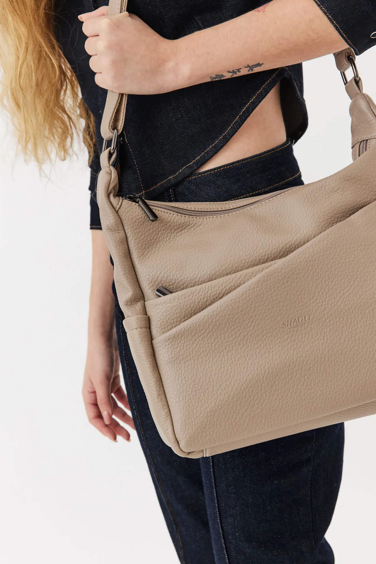 תיק צד נשי- בז'